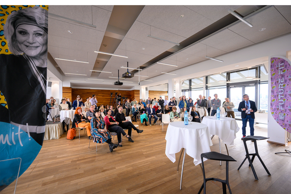 View of audience at bar tables and seated