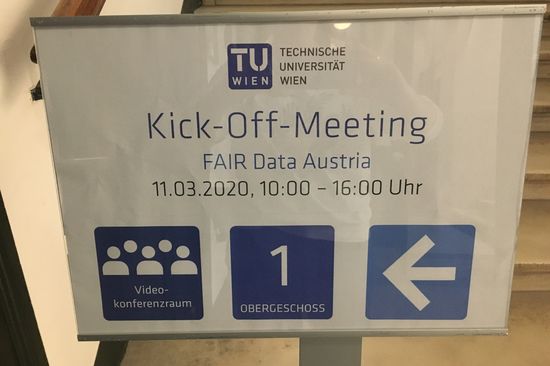 Phogo of sign post of kickoff event