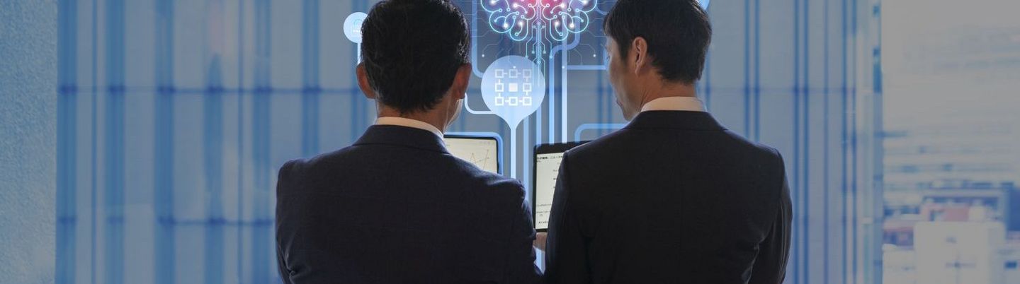2 people using AI-tool at job