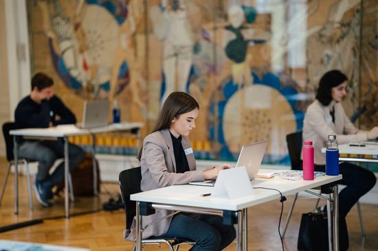 students working on laptops