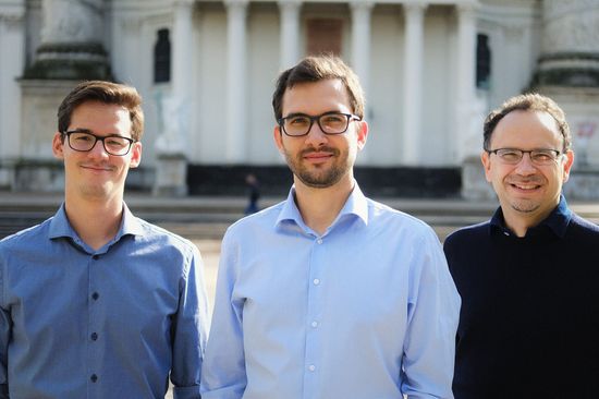 Three scientists on Karlsplatz in Vienna