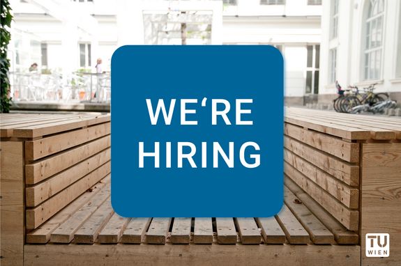 Foto einer Holzbank in einem Innenhof der TU Wien mit dem Schriftzug "We're hiring".