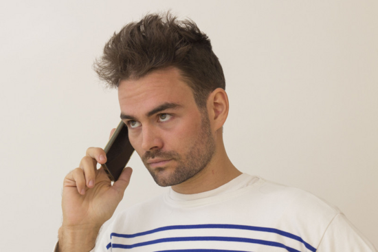 Der Mann beim telefonieren