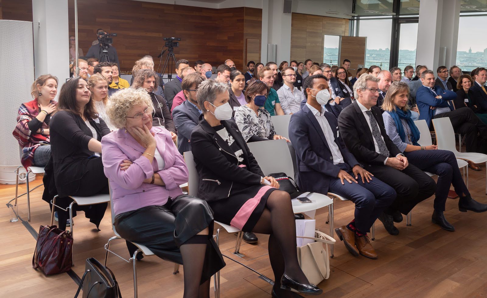 Participants watching John Warner's video statement