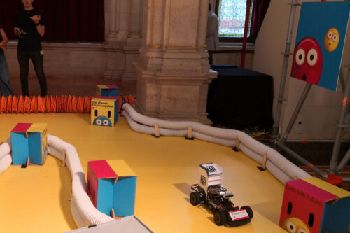Model race car on the track at Rathaus