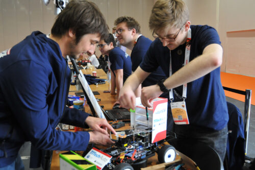 Students working on model race car