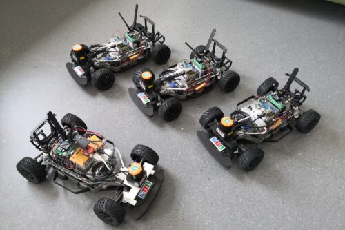4 race cars on the floor