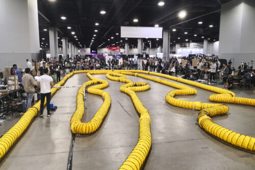 Race track with yellow pipes on the floor