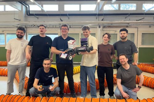 Group picture of Team LAMARRacing and Team Scuderia Segfault