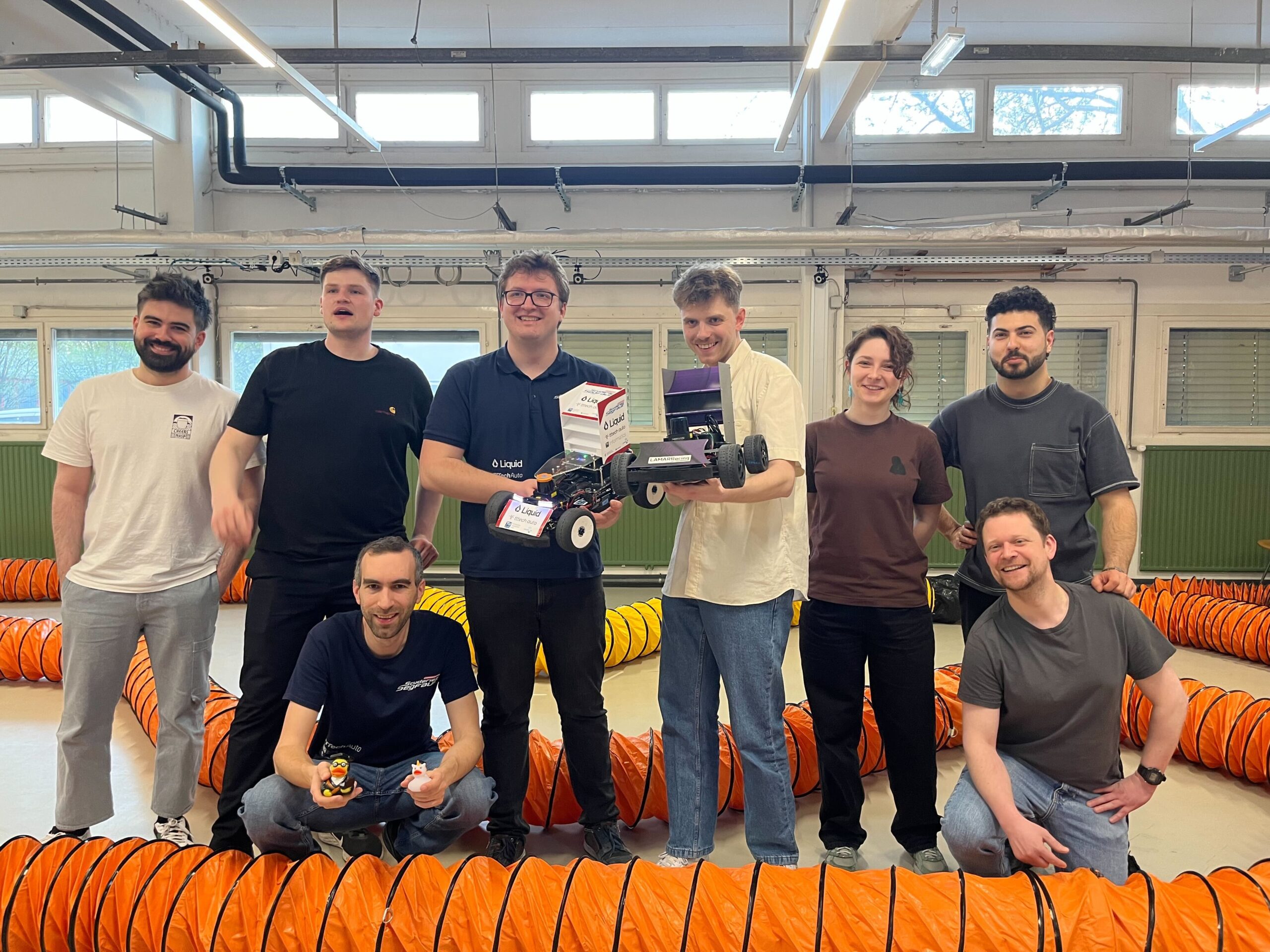 Group picture of Team LAMARRacing and Team Scuderia Segfault
