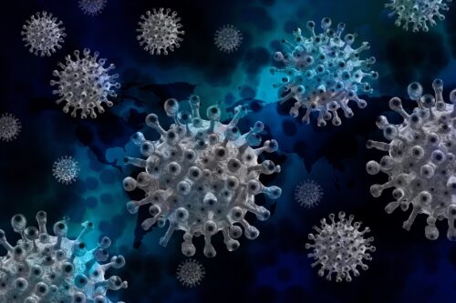 Gray viruses float against a dark blue background